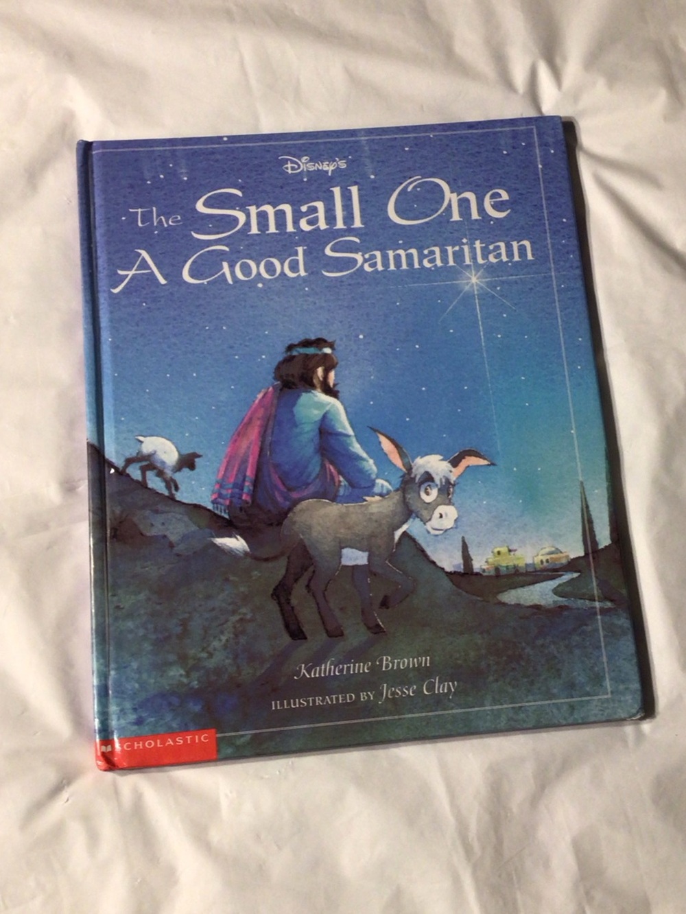 Disney The Small One A Good Samaritan - blue illustrated children's book